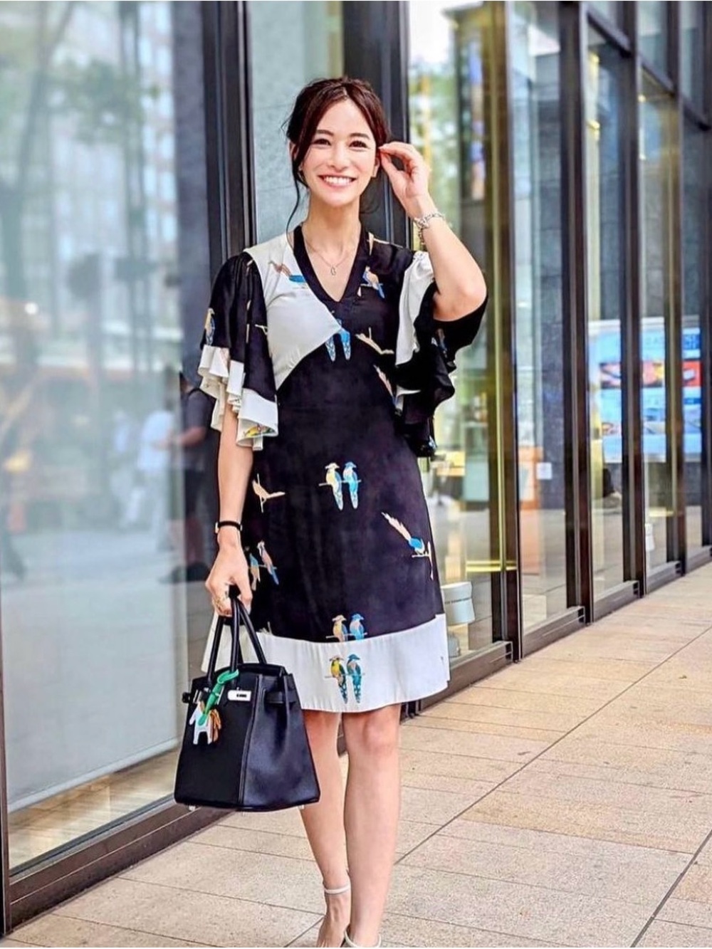 Loewe Black & White V‑Neck Mini Dress with Parrot Motif